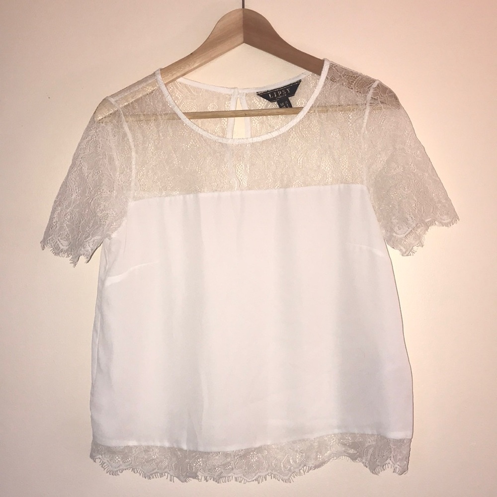 Sheer and lace white blouse.